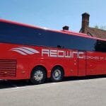 Redwing coach parked on road